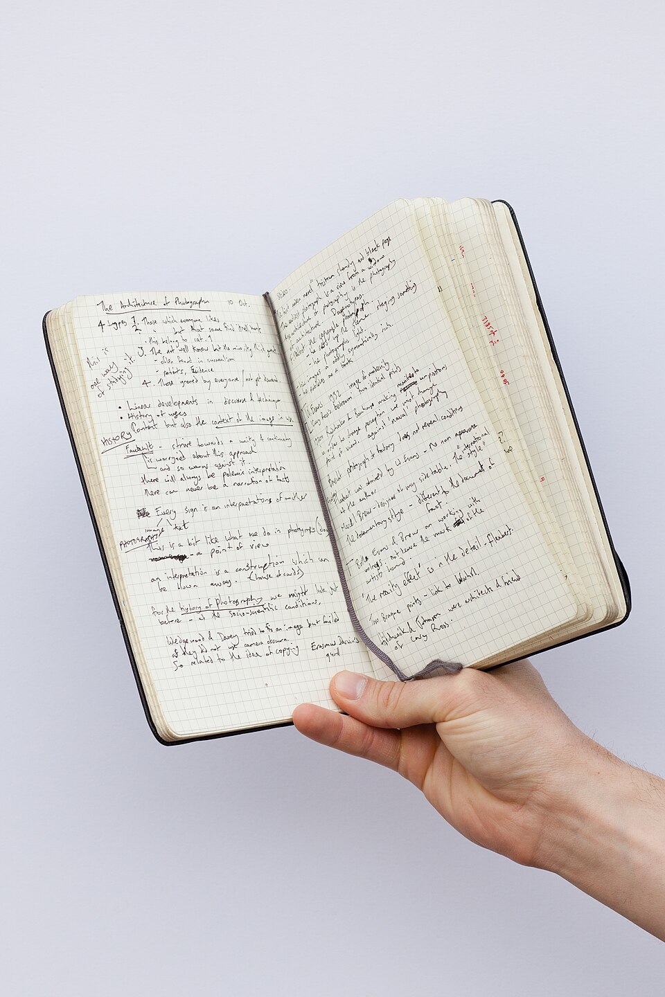 An open notebook filled with handwritten analysis notes and structured thoughts, captured during an early diagnostic session.